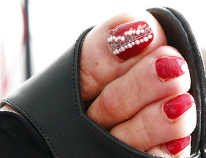 18 year old girl Katie Lewis stands naked after undressing in her bedroom